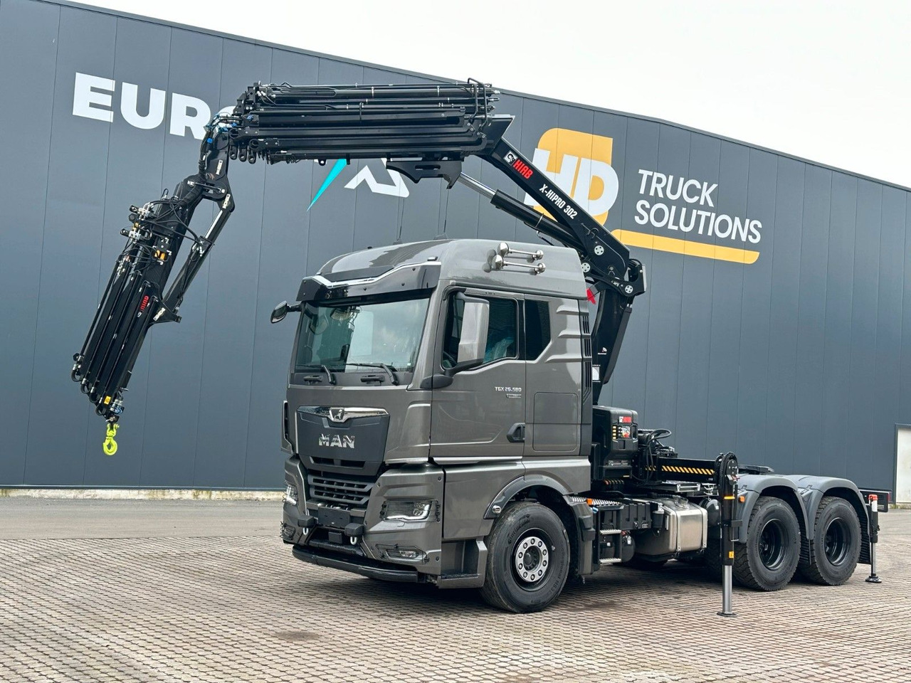 MAN TGX 26.580 6x4 Kran Hiab 302-6 + Jib-4 - Cabeza tractora: foto 1 MAN TGX 26.580 6x4 Kran Hiab 302-6 + Jib-4 - Cabeza tractora: foto 1
