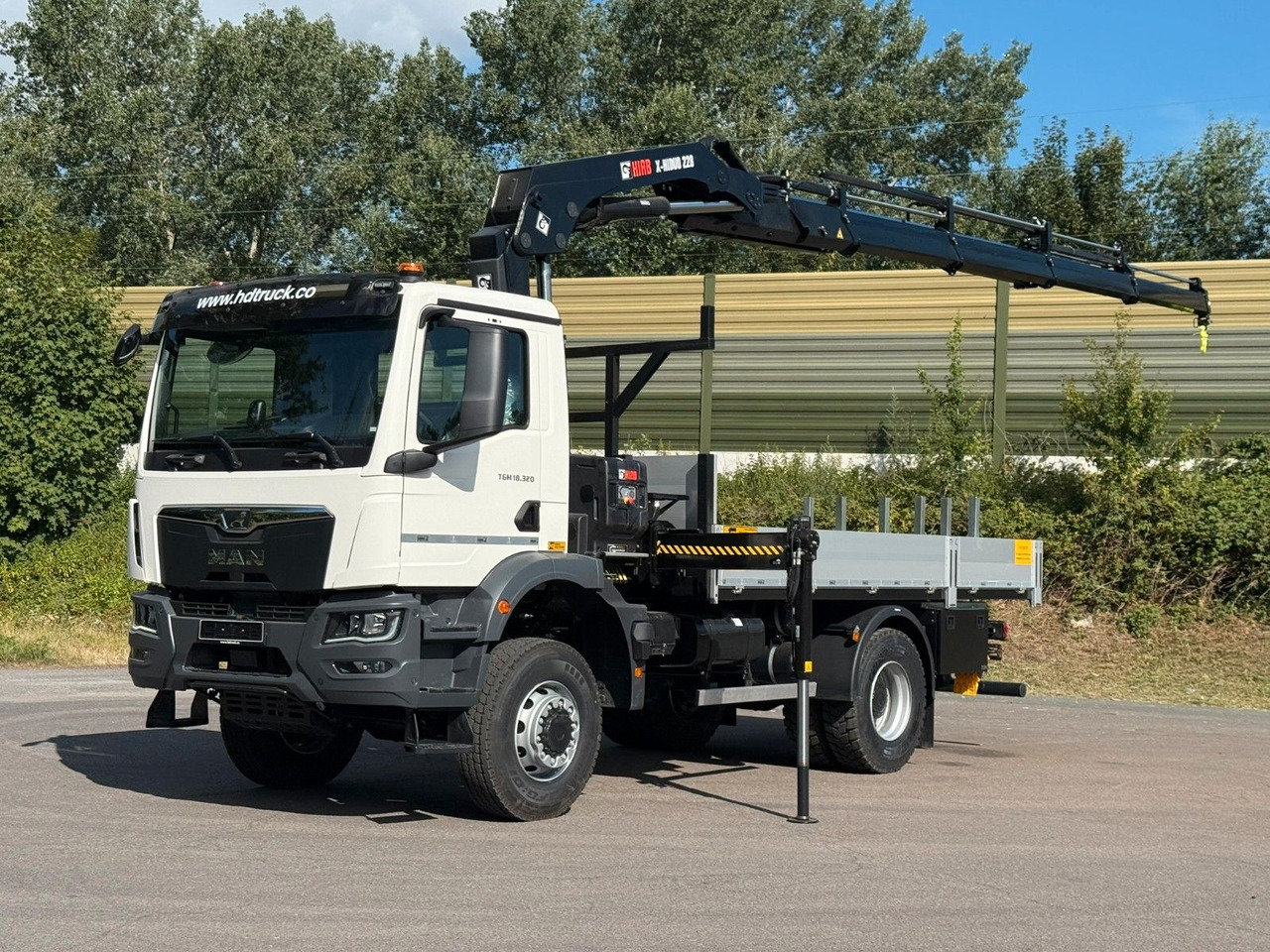 MAN TGM 18.320 4x4 Hiab 228-4 Kran - Camión grúa: foto 1 MAN TGM 18.320 4x4 Hiab 228-4 Kran - Camión grúa: foto 1