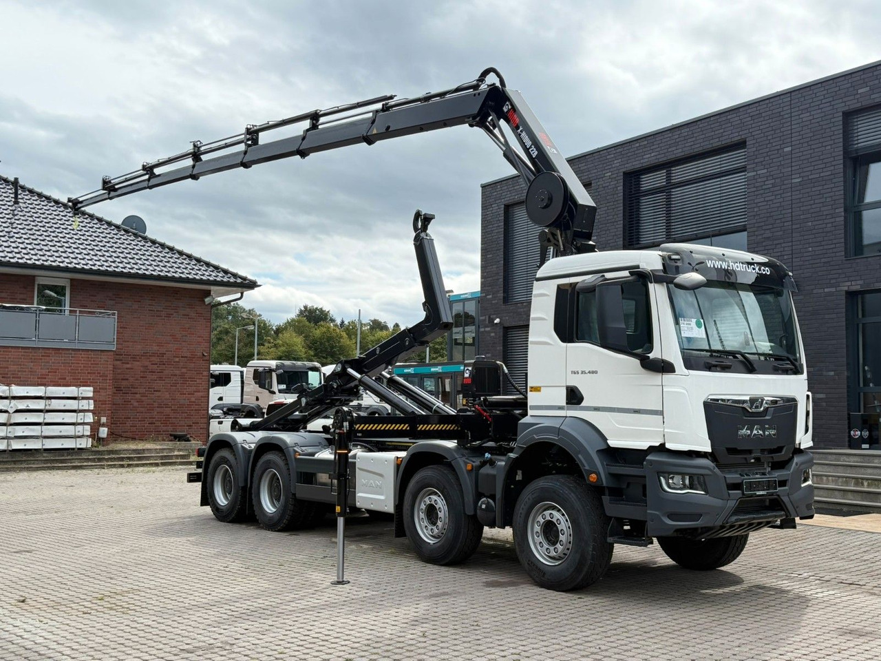 MAN TGS 35.480 8x4 Abrollkipper + Kran HIAB 228-6 - Multibasculante camión, Camión grúa: foto 1 MAN TGS 35.480 8x4 Abrollkipper + Kran HIAB 228-6 - Multibasculante camión, Camión grúa: foto 1