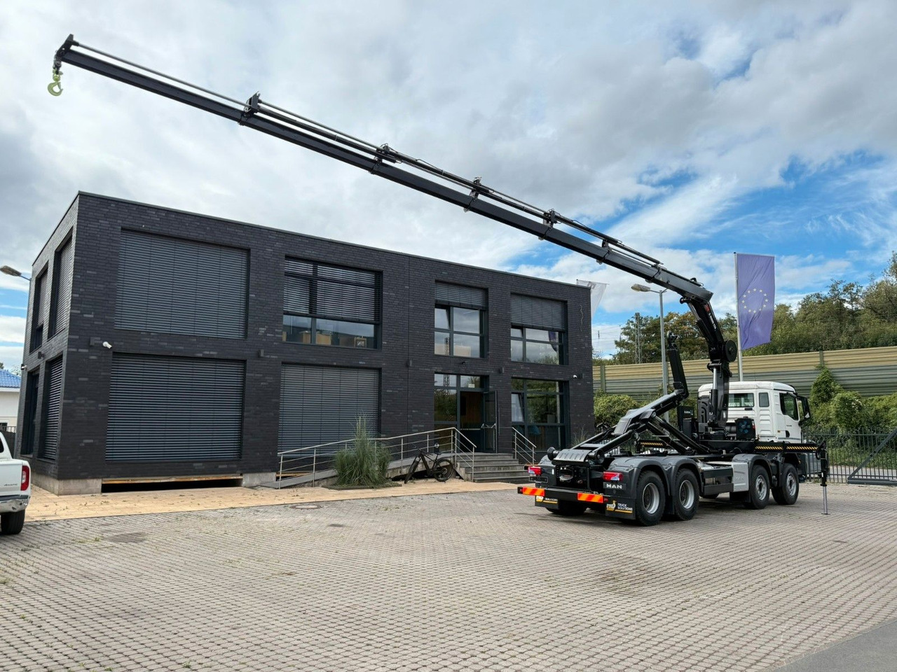 MAN TGS 35.480 8x4 Abrollkipper + Kran HIAB 228-6 - Multibasculante camión, Camión grúa: foto 4 MAN TGS 35.480 8x4 Abrollkipper + Kran HIAB 228-6 - Multibasculante camión, Camión grúa: foto 4