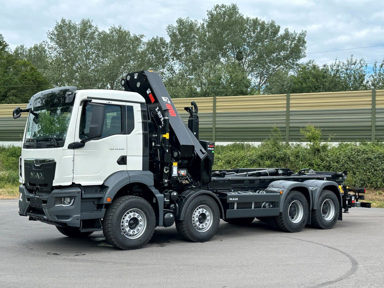 MAN TGS 35.520 8x4 Abrollkipper + Kran HIAB 658E6 - Multibasculante camión, Camión grúa: foto 3 MAN TGS 35.520 8x4 Abrollkipper + Kran HIAB 658E6 - Multibasculante camión, Camión grúa: foto 3