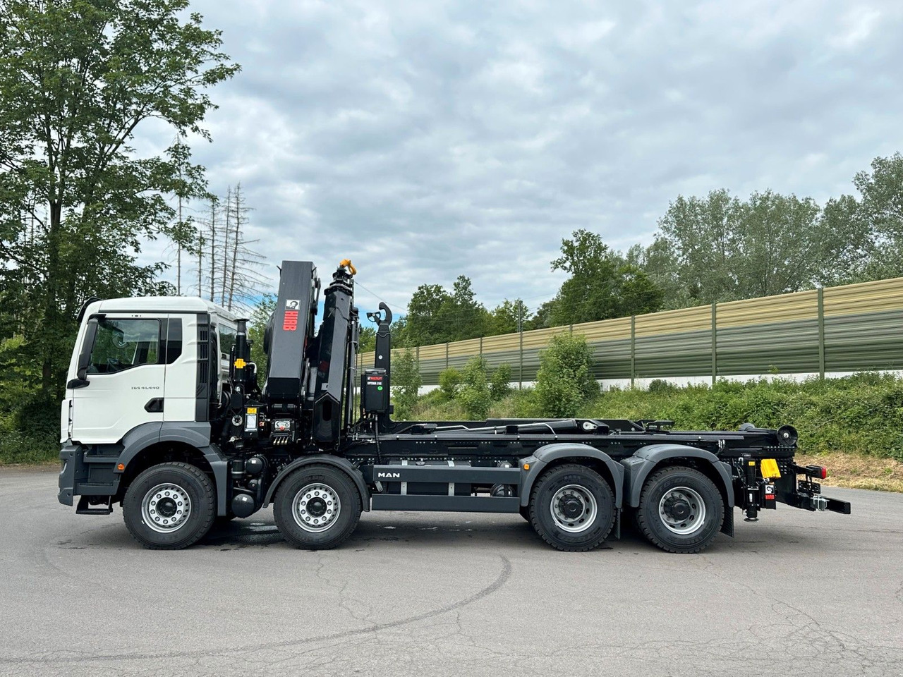 MAN TGS 35.520 8x4 Abrollkipper + Kran HIAB 658E6 - Multibasculante camión, Camión grúa: foto 4 MAN TGS 35.520 8x4 Abrollkipper + Kran HIAB 658E6 - Multibasculante camión, Camión grúa: foto 4