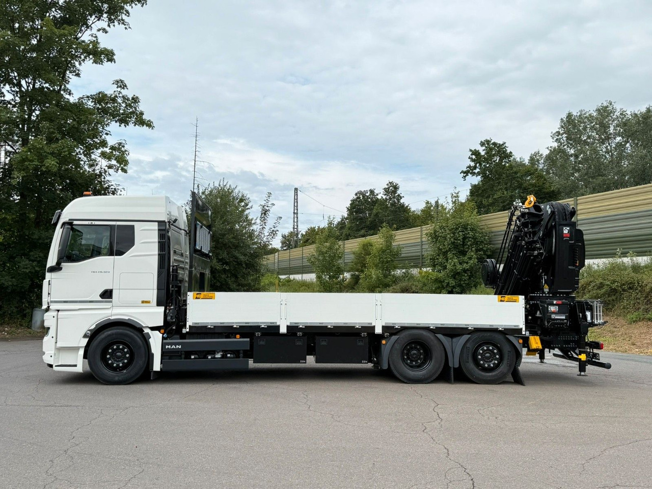 MAN TGX 26.520 TG3 Retarder / 6X2 Hiab 548 E 8 - Camión grúa: foto 4 MAN TGX 26.520 TG3 Retarder / 6X2 Hiab 548 E 8 - Camión grúa: foto 4