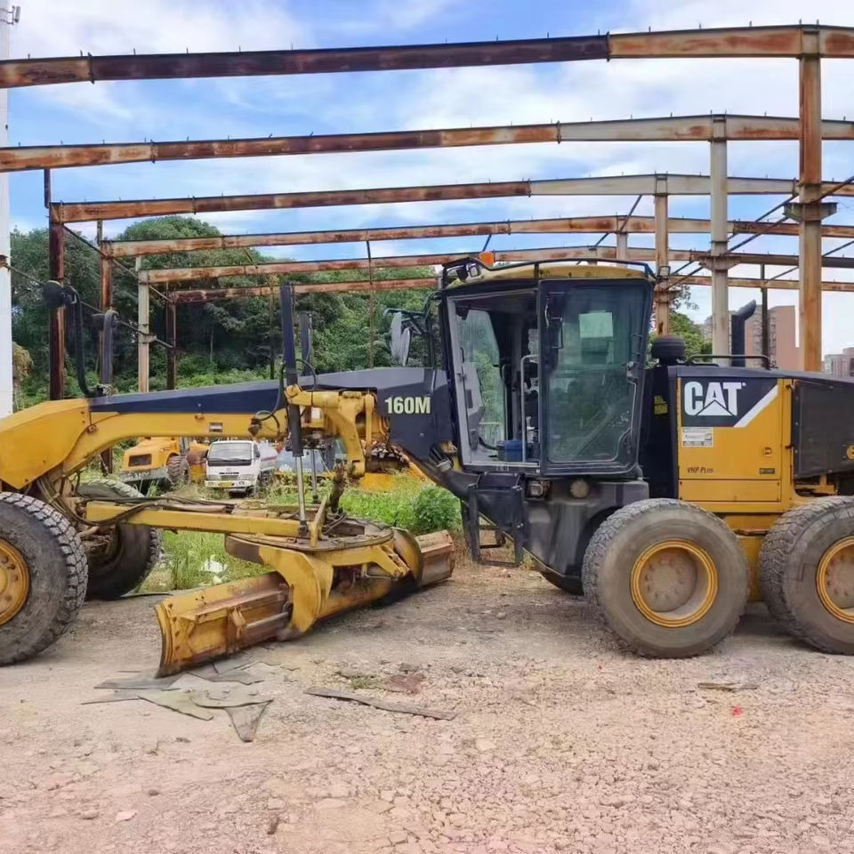 Original CAT 160M Grader Used Caterpillar Brand CAT 140H 140K 160K 120H 14G Motor Grader High Quality - Grader: foto 1 Original CAT 160M Grader Used Caterpillar Brand CAT 140H 140K 160K 120H 14G Motor Grader High Quality - Grader: foto 1