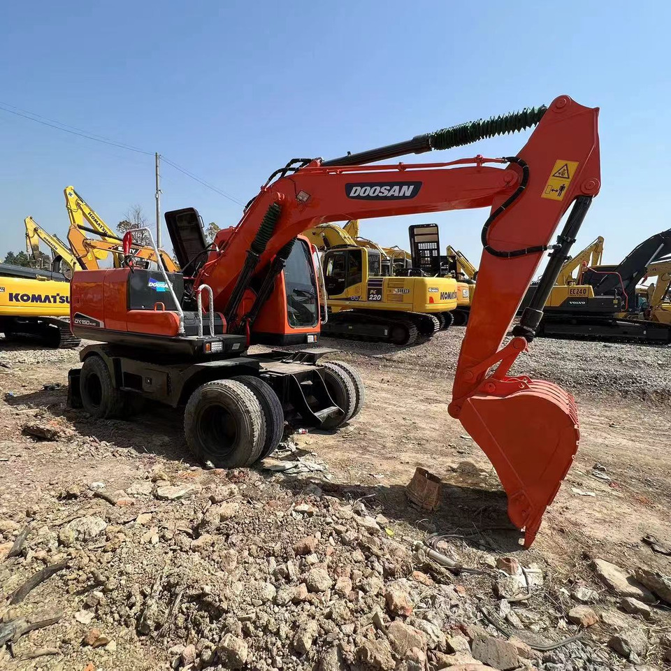 DOOSAN DH150W-7 - Excavadora de ruedas: foto 1 DOOSAN DH150W-7 - Excavadora de ruedas: foto 1