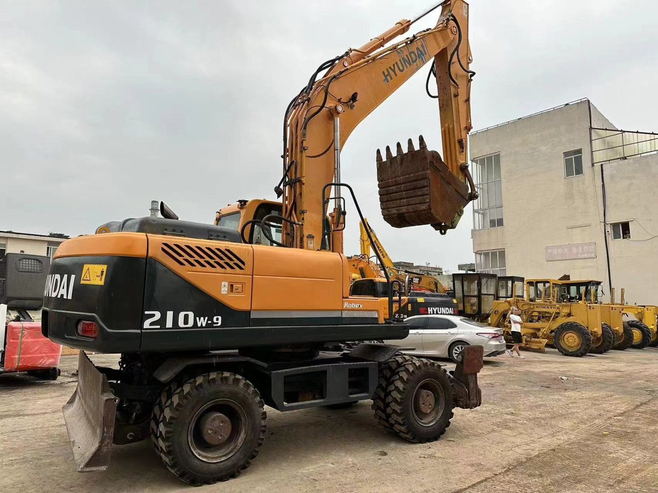 Hyundai 210w-9 - Excavadora de ruedas: foto 1 Hyundai 210w-9 - Excavadora de ruedas: foto 1