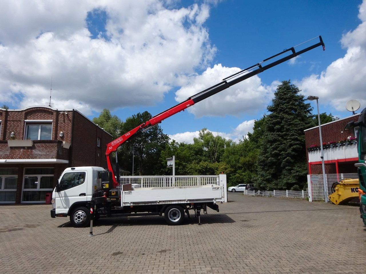 FUSO Canter 7C15 mit FASSI F65A Kran - Caja abierta furgoneta: foto 4 FUSO Canter 7C15 mit FASSI F65A Kran - Caja abierta furgoneta: foto 4