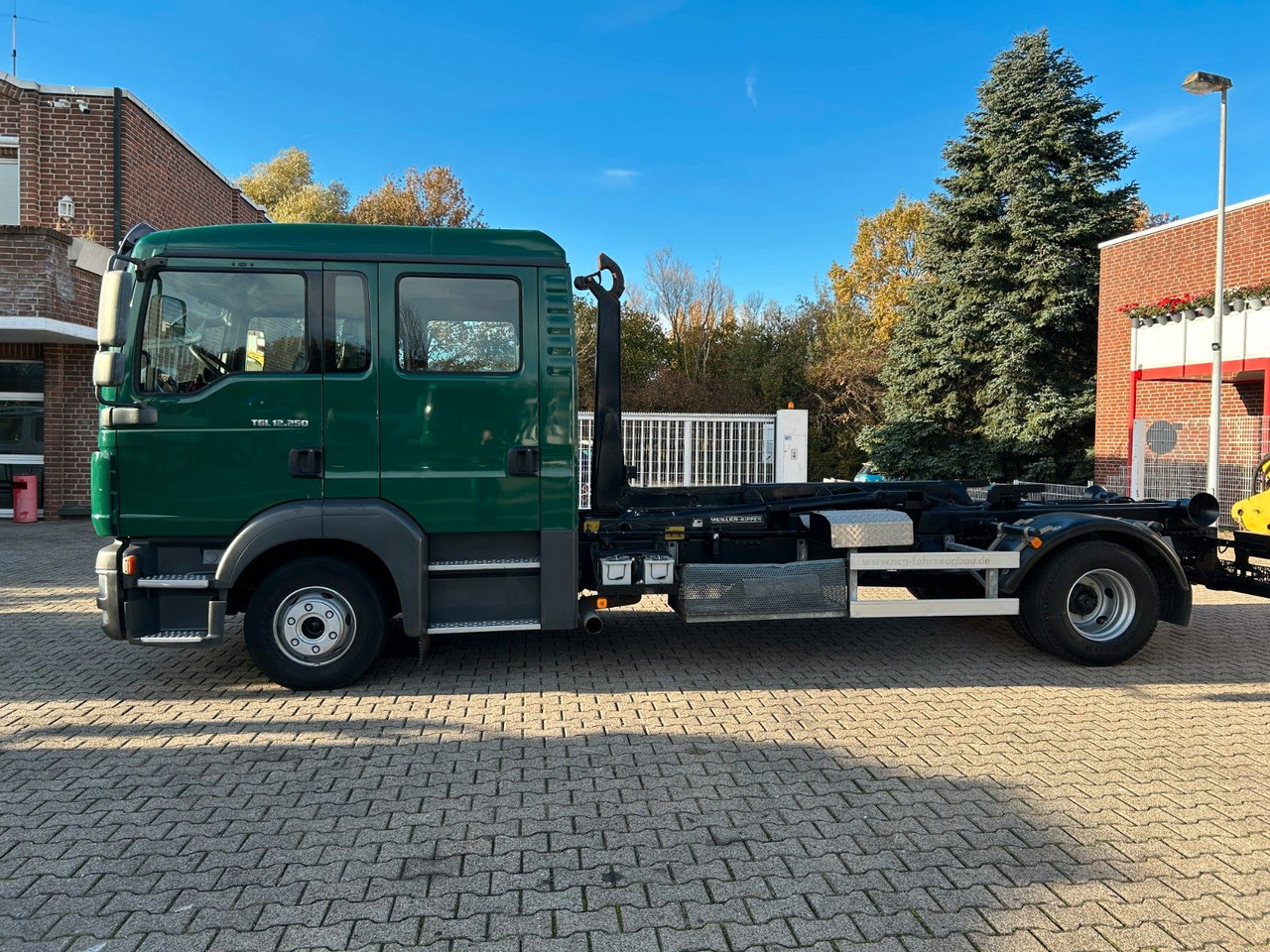 MAN 12.250 Doppelkabine Abroller - Multibasculante camión: foto 2 MAN 12.250 Doppelkabine Abroller - Multibasculante camión: foto 2