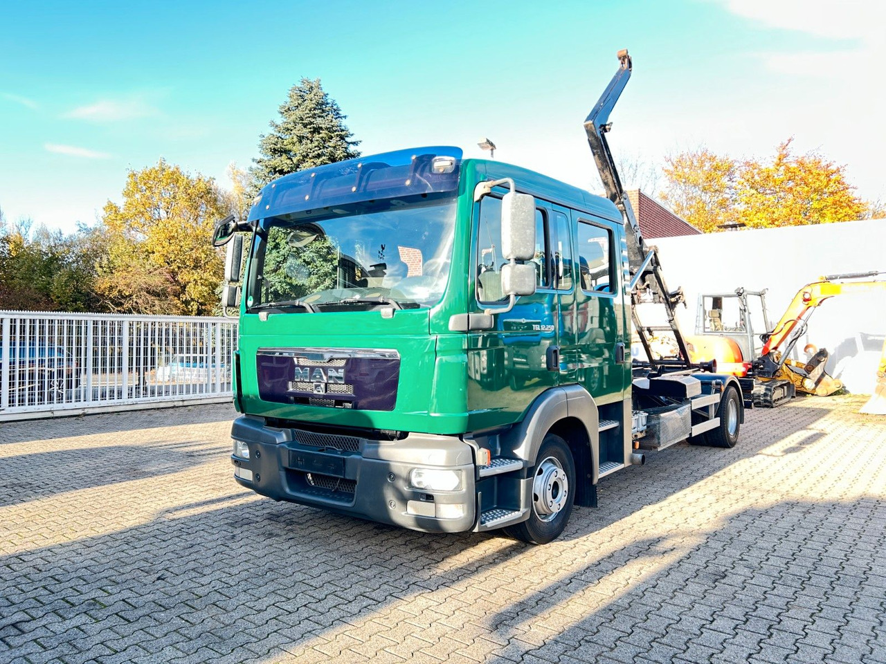 MAN 12.250 Doppelkabine Abroller - Multibasculante camión: foto 2 MAN 12.250 Doppelkabine Abroller - Multibasculante camión: foto 2