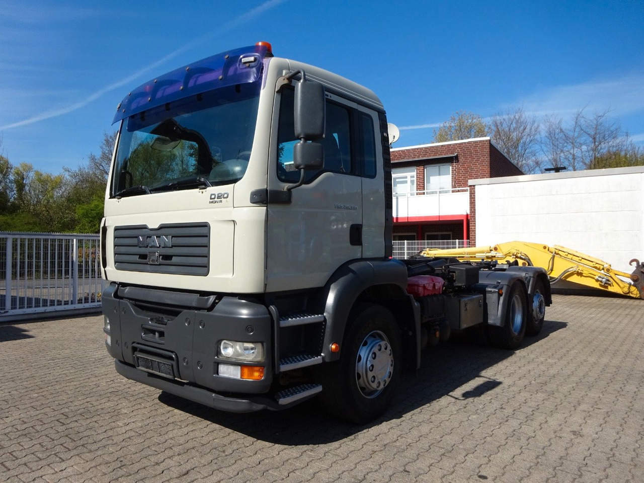 MAN 26.310 TGA Knickbarer Haken mit Lift+Lenkachse - Multibasculante camión: foto 2 MAN 26.310 TGA Knickbarer Haken mit Lift+Lenkachse - Multibasculante camión: foto 2