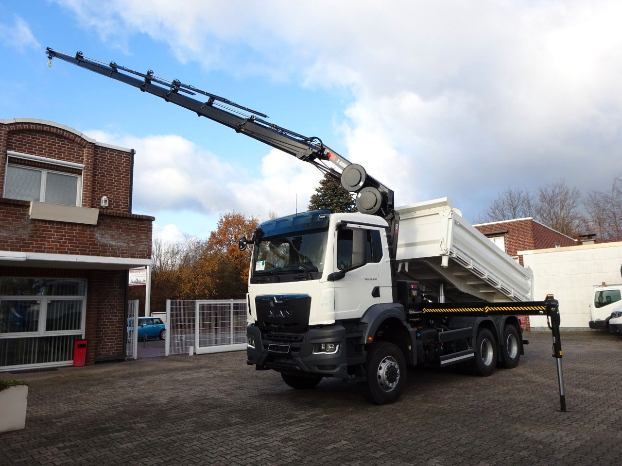 MAN 33.430 6x6 3-SEITENKIPPER KRAN HIAB 228- 6HYDRO - Volquete camión, Camión grúa: foto 3 MAN 33.430 6x6 3-SEITENKIPPER KRAN HIAB 228- 6HYDRO - Volquete camión, Camión grúa: foto 3