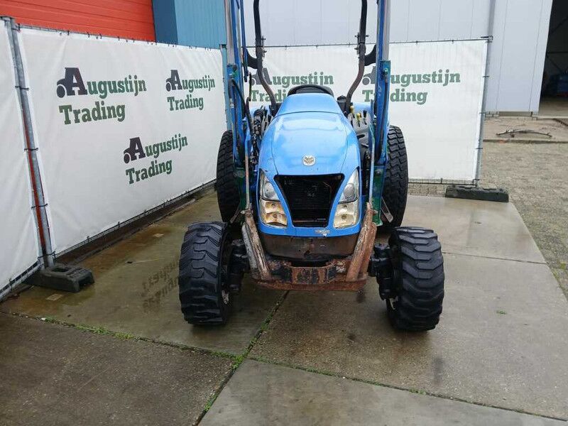 New Holland TC40 DA - Tractor: foto 2 New Holland TC40 DA - Tractor: foto 2