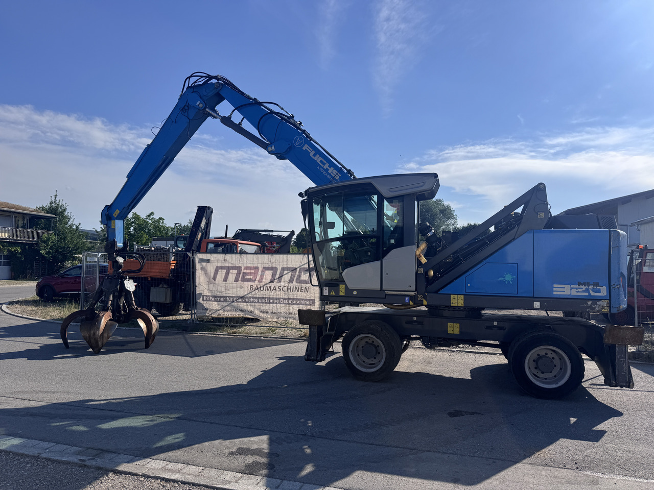 FUCHS MHL 320 F - Manipulador de materiales: foto 2 FUCHS MHL 320 F - Manipulador de materiales: foto 2
