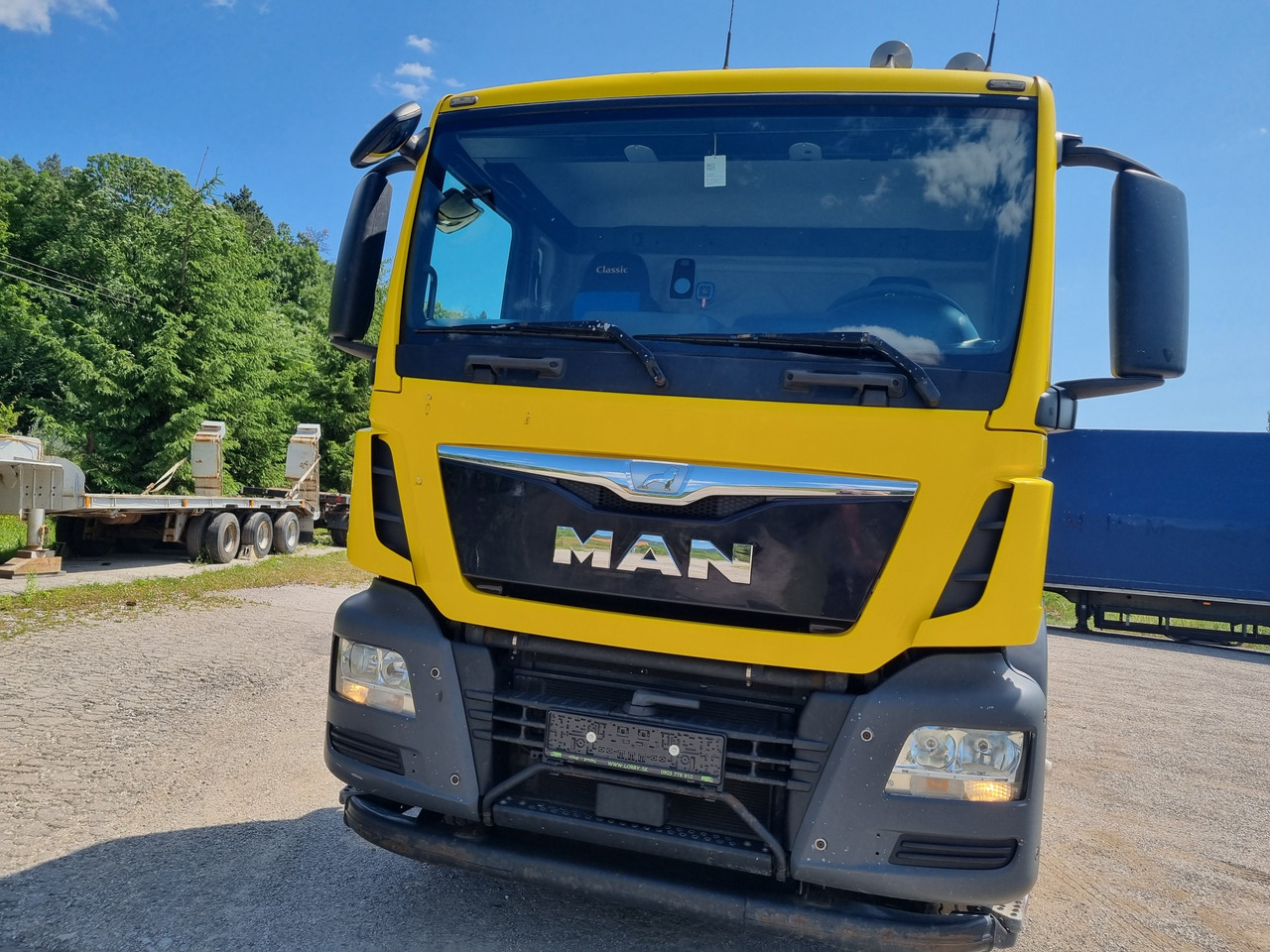 MAN TGS 33.480 6x4 ABROLLKIPPER HIAB Multilift 18 T - Multibasculante camión: foto 2 MAN TGS 33.480 6x4 ABROLLKIPPER HIAB Multilift 18 T - Multibasculante camión: foto 2