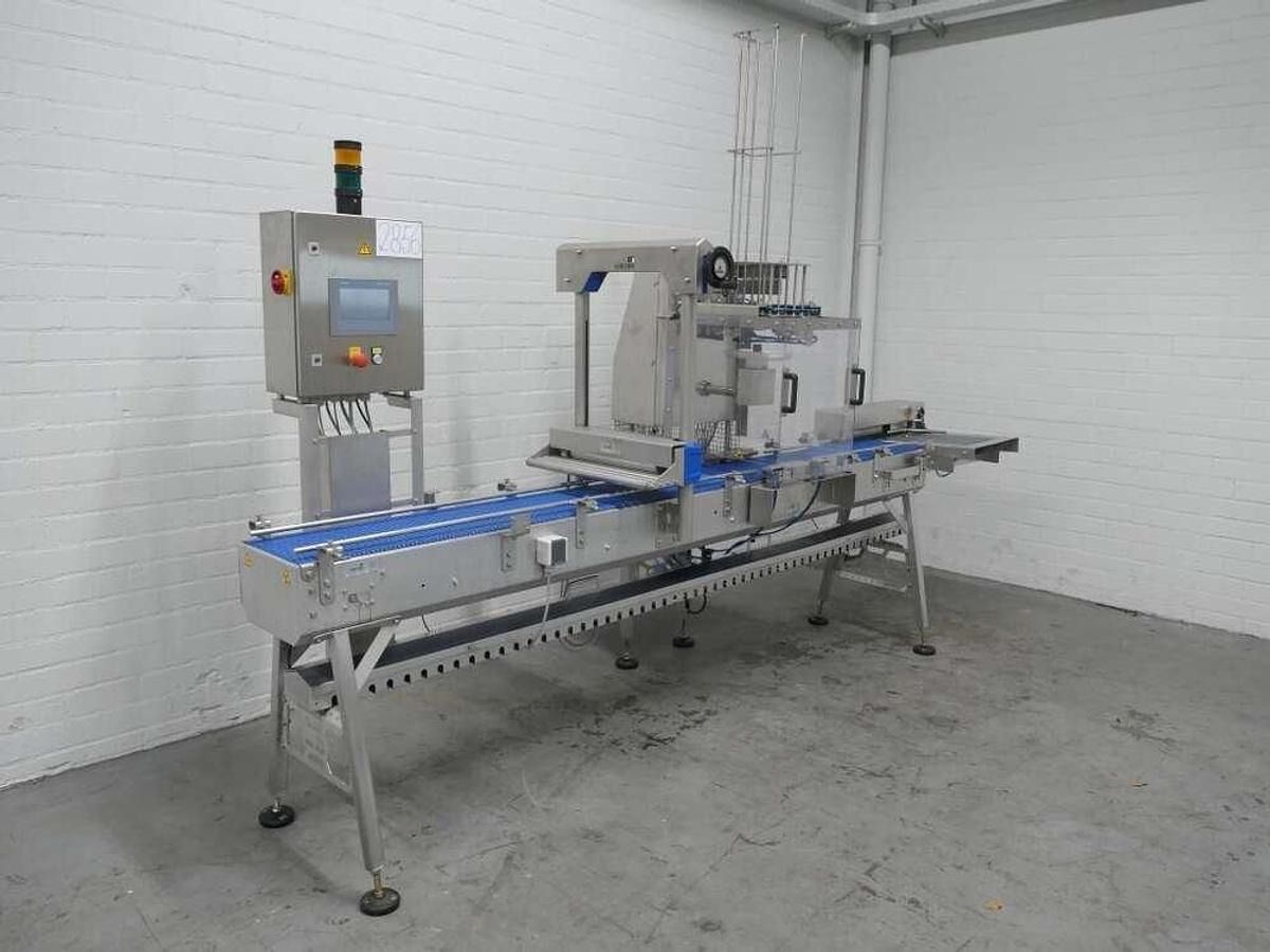 Van Rijn lidding machine - Máquina de embalaje: foto 1 Van Rijn lidding machine - Máquina de embalaje: foto 1