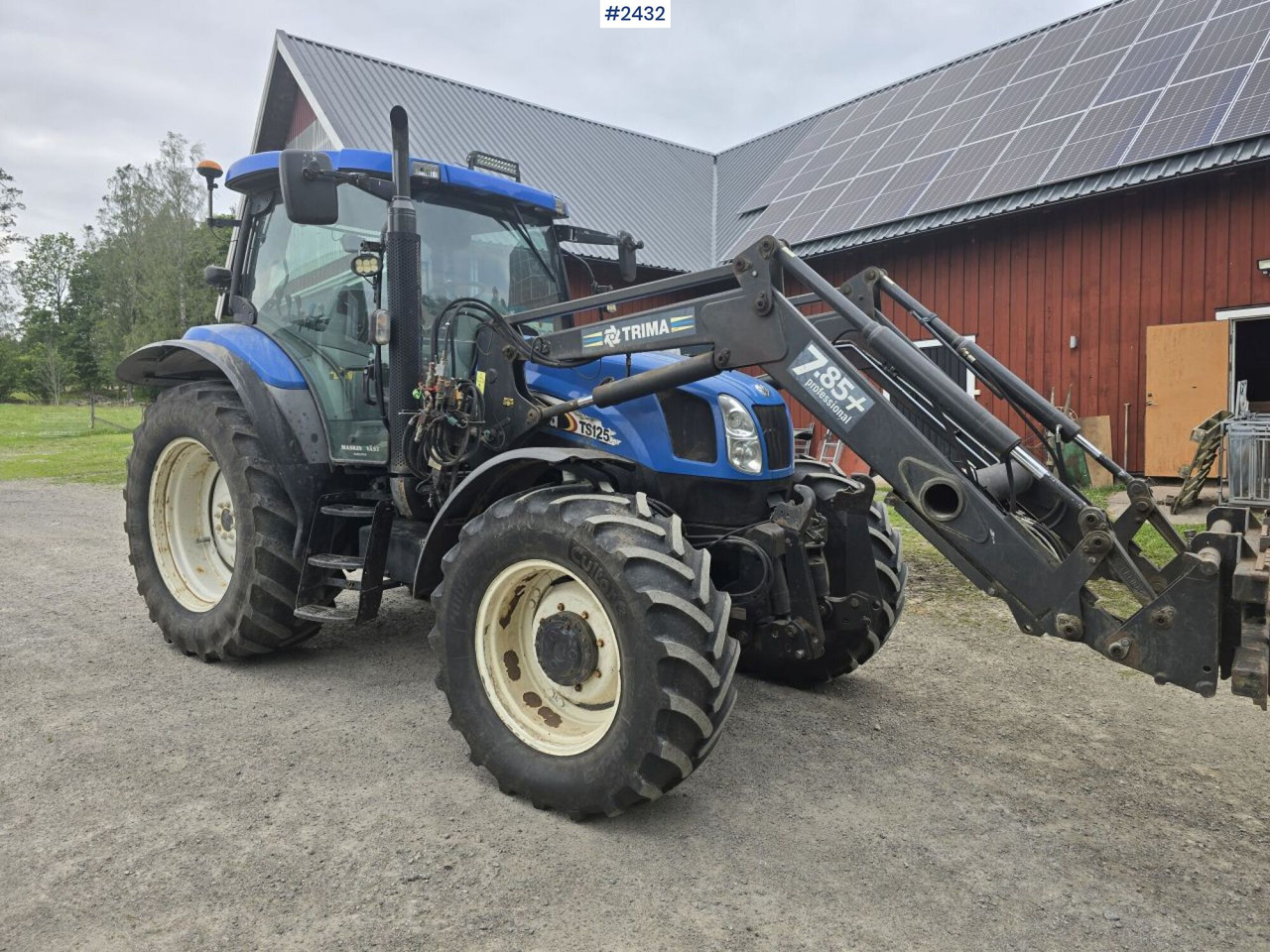 New Holland TS 125A med Frontlastare - Tractor: foto 2 New Holland TS 125A med Frontlastare - Tractor: foto 2