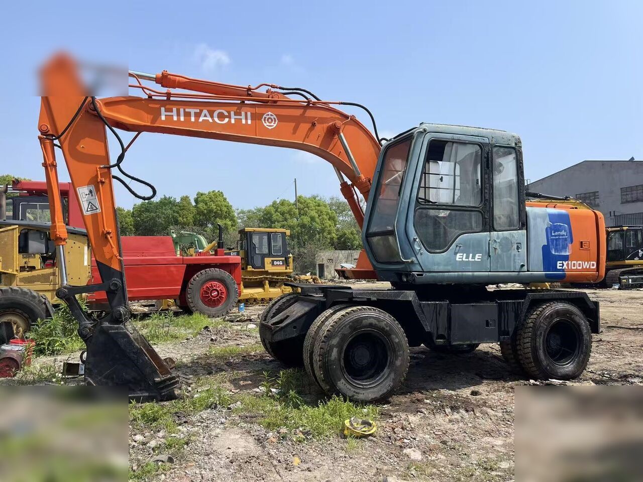 HITACHI EX100W - Excavadora de ruedas: foto 1 HITACHI EX100W - Excavadora de ruedas: foto 1