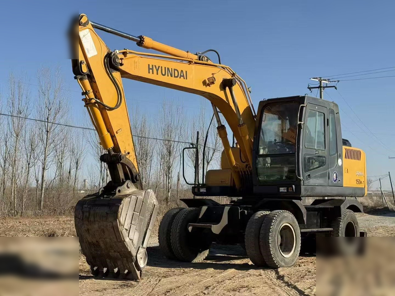 HYUNDAI ROBEX 150W-7A - Excavadora de ruedas: foto 3 HYUNDAI ROBEX 150W-7A - Excavadora de ruedas: foto 3