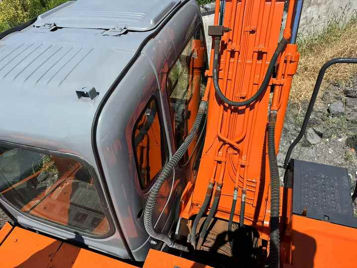 Used Wheel Excavator Hitachi ZX 130W Made in Japan 13ton Hitachi Zx130w Wheel Excavator Price Used Hitachi Zx130 Excavator SALE - Excavadora de ruedas: foto 5 Used Wheel Excavator Hitachi ZX 130W Made in Japan 13ton Hitachi Zx130w Wheel Excavator Price Used Hitachi Zx130 Excavator SALE - Excavadora de ruedas: foto 5