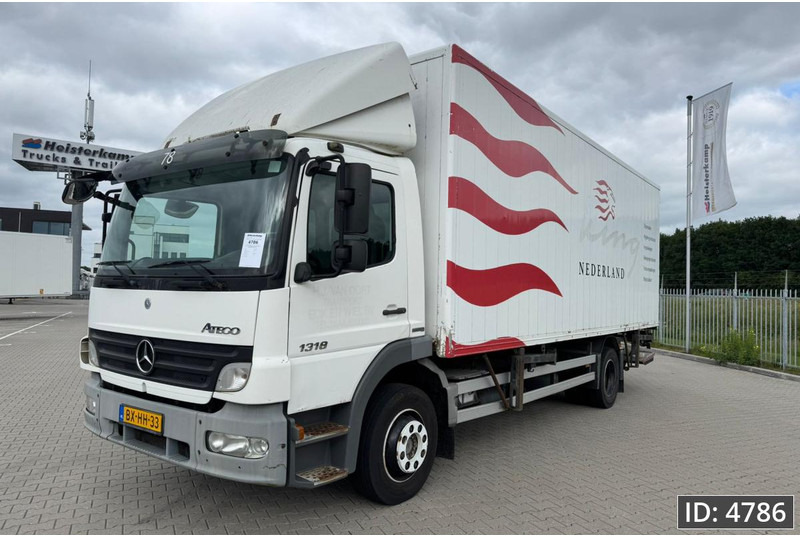 Mercedes-Benz Atego 1318 Day Cab, Euro 5, BDF / EPS automatic / DHOLLANDIA 2000KG - Portacontenedore/ Intercambiable camión: foto 1 Mercedes-Benz Atego 1318 Day Cab, Euro 5, BDF / EPS automatic / DHOLLANDIA 2000KG - Portacontenedore/ Intercambiable camión: foto 1