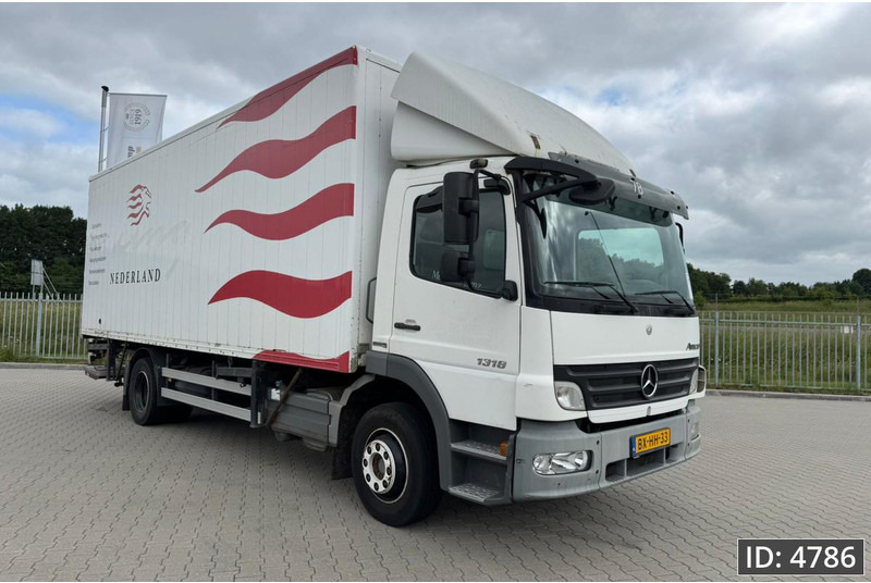 Mercedes-Benz Atego 1318 Day Cab, Euro 5, BDF / EPS automatic / DHOLLANDIA 2000KG - Portacontenedore/ Intercambiable camión: foto 4 Mercedes-Benz Atego 1318 Day Cab, Euro 5, BDF / EPS automatic / DHOLLANDIA 2000KG - Portacontenedore/ Intercambiable camión: foto 4