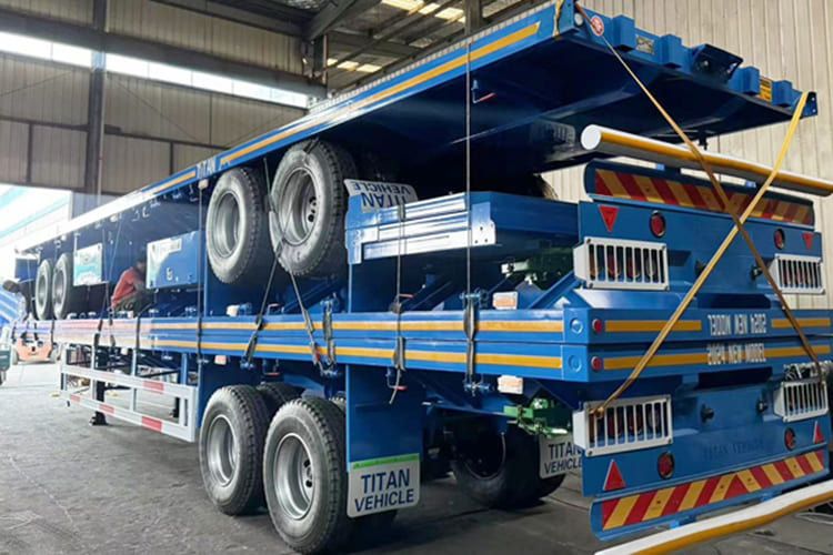 TITAN 45ft 2 Axle Flatbed Trailer for sale in Tanzania - Semirremolque plataforma/ Caja abierta: foto 3 TITAN 45ft 2 Axle Flatbed Trailer for sale in Tanzania - Semirremolque plataforma/ Caja abierta: foto 3