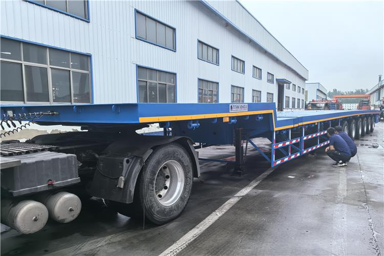 TITAN 6 Axle 54m Telescopic Flatbed Trailer for Sale In Angola - Semirremolque plataforma/ Caja abierta: foto 1 TITAN 6 Axle 54m Telescopic Flatbed Trailer for Sale In Angola - Semirremolque plataforma/ Caja abierta: foto 1