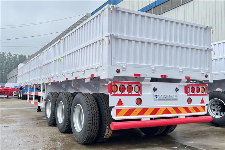 TITAN Tri Axle Dropside Trailer For Sale In Nigeria Lagos - Semirremolque plataforma/ Caja abierta: foto 3 TITAN Tri Axle Dropside Trailer For Sale In Nigeria Lagos - Semirremolque plataforma/ Caja abierta: foto 3