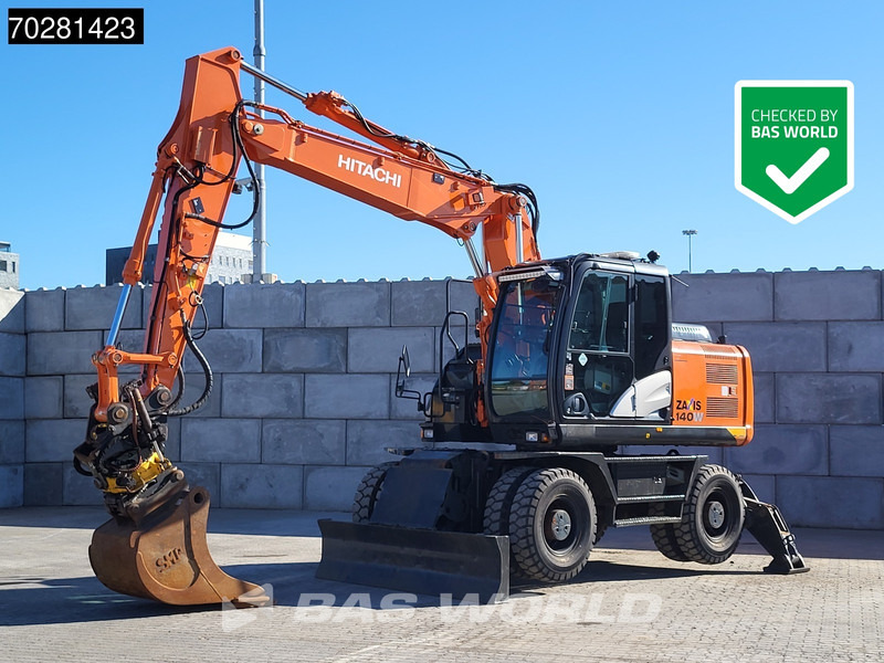 Hitachi ZX140W -5 OUTRIGGERS + BLADE - Excavadora de ruedas: foto 1 Hitachi ZX140W -5 OUTRIGGERS + BLADE - Excavadora de ruedas: foto 1