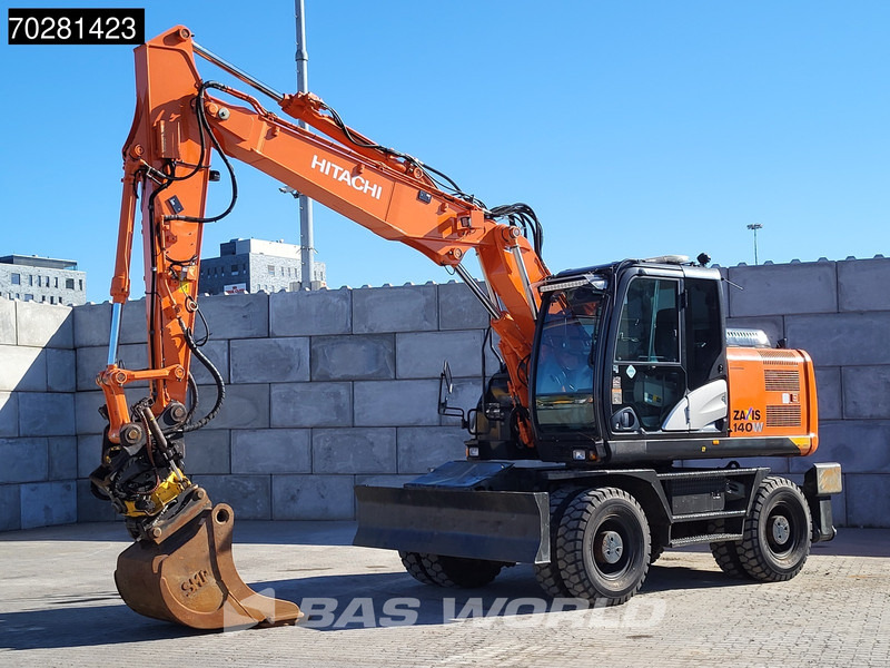 Hitachi ZX140W -5 OUTRIGGERS + BLADE - Excavadora de ruedas: foto 2 Hitachi ZX140W -5 OUTRIGGERS + BLADE - Excavadora de ruedas: foto 2