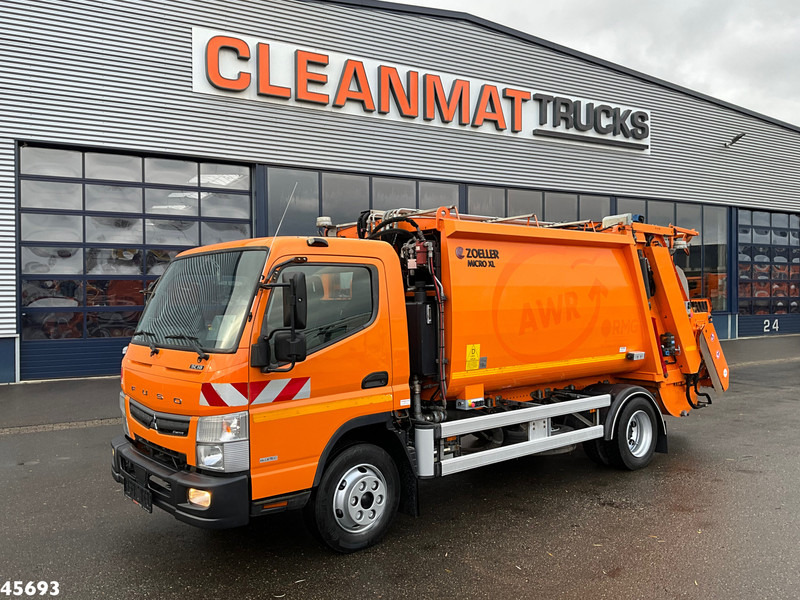 FUSO Canter 9C18 Euro 6 Zoeller 7m³ Just 176.158 km! - Camión de basura: foto 1 FUSO Canter 9C18 Euro 6 Zoeller 7m³ Just 176.158 km! - Camión de basura: foto 1