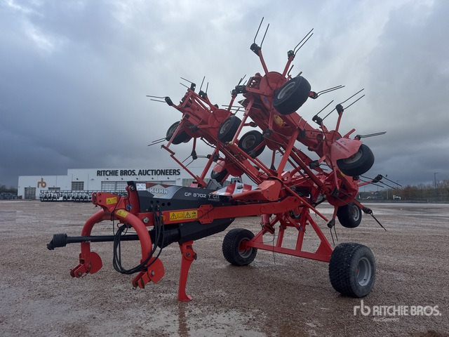 2013 Kuhn GF 8702 TG2 8.7 m Semi-Mount 8 Rotor Faneuse Hay Tedder - Henificadora: foto 1 2013 Kuhn GF 8702 TG2 8.7 m Semi-Mount 8 Rotor Faneuse Hay Tedder - Henificadora: foto 1