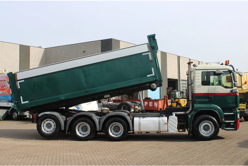 MAN TGA 35.400 8X4 + MANUAL! + NCH kipper/ bitum sprayer - Camión con equipo de cable: foto 4 MAN TGA 35.400 8X4 + MANUAL! + NCH kipper/ bitum sprayer - Camión con equipo de cable: foto 4