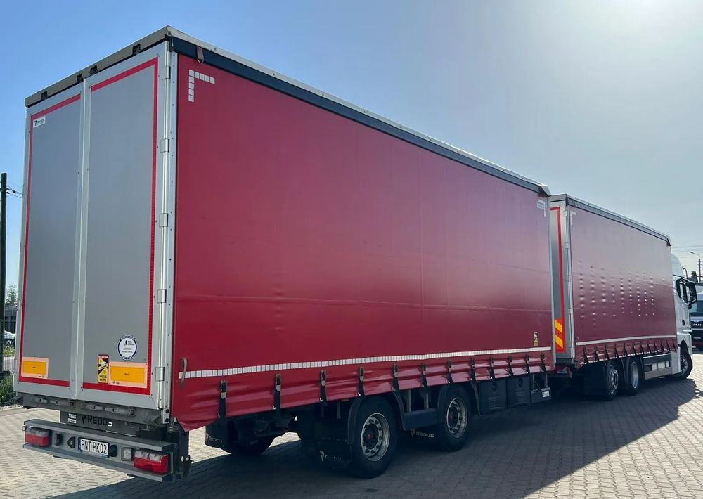 MAN TGX 26.470 z przyczepą Redos - Camión lona: foto 5 MAN TGX 26.470 z przyczepą Redos - Camión lona: foto 5