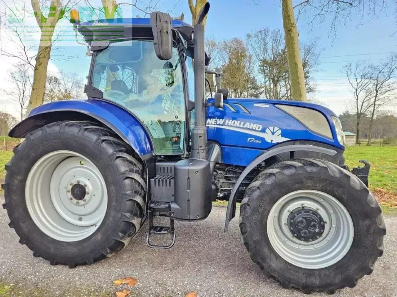 New Holland t7.190 ac ( t7.225 t7.175 t7.165 ) bleu power - Tractor: foto 1 New Holland t7.190 ac ( t7.225 t7.175 t7.165 ) bleu power - Tractor: foto 1