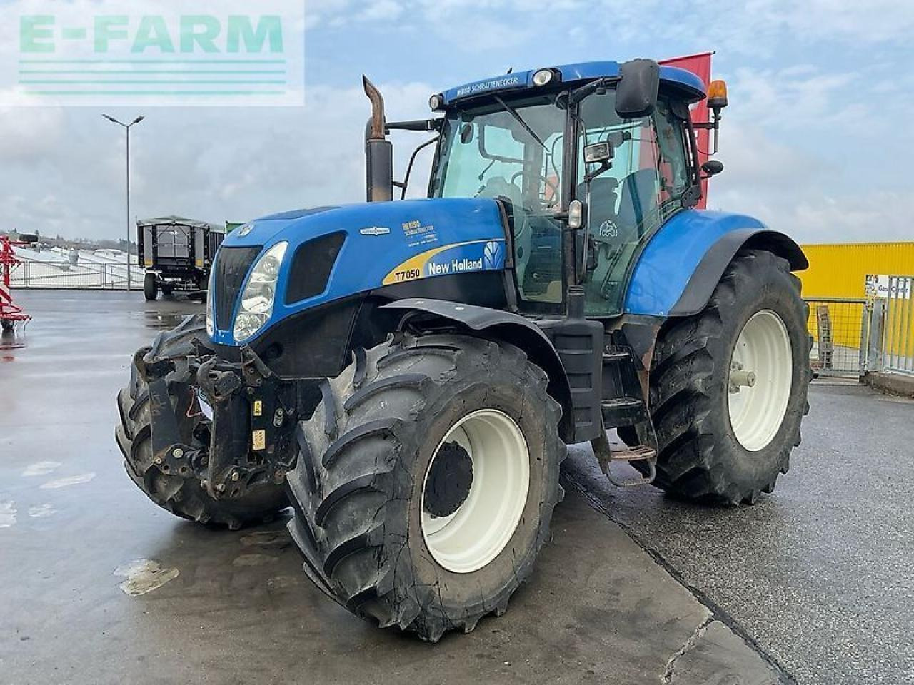 New Holland t7050 - Tractor: foto 1 New Holland t7050 - Tractor: foto 1