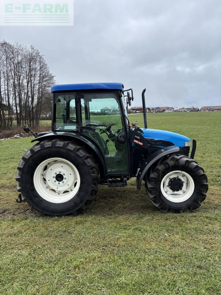 New Holland tn-d 70 D - Tractor: foto 2 New Holland tn-d 70 D - Tractor: foto 2