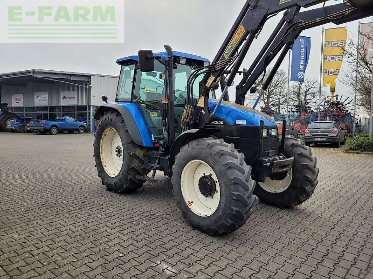 New Holland ts115 / ts 115 - Tractor: foto 2 New Holland ts115 / ts 115 - Tractor: foto 2