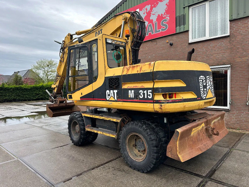 Caterpillar M315 +ROTO CE - Excavadora de ruedas: foto 4 Caterpillar M315 +ROTO CE - Excavadora de ruedas: foto 4