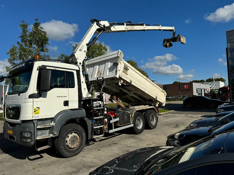 MAN TGS 26.400 6X4 HIAB 166D + REMOTE CONTROL + 2 WAYS KIPPER TÜV TILL 07-2025 - Volquete camión, Camión grúa: foto 1 MAN TGS 26.400 6X4 HIAB 166D + REMOTE CONTROL + 2 WAYS KIPPER TÜV TILL 07-2025 - Volquete camión, Camión grúa: foto 1