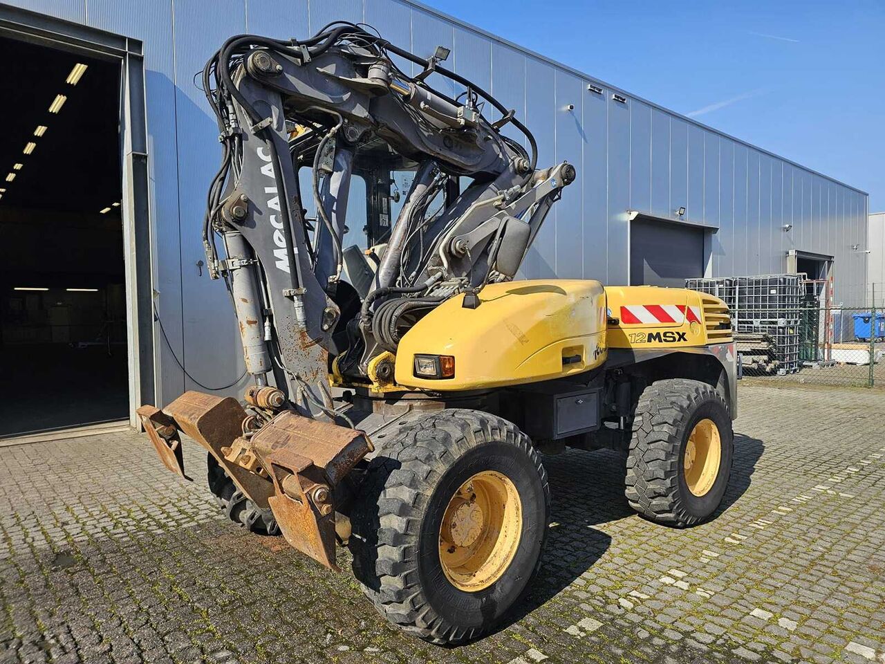 MECALAC - 12MSX - INCL. BUCKETS + PALLET FORKS - MOBILE CRANE - Retroexcavadora: foto 2 MECALAC - 12MSX - INCL. BUCKETS + PALLET FORKS - MOBILE CRANE - Retroexcavadora: foto 2