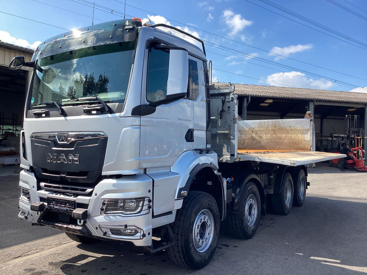 MAN TGS 35.520 8x4 Intarder Meiller Bordmatik Hendri - Volquete camión: foto 1 MAN TGS 35.520 8x4 Intarder Meiller Bordmatik Hendri - Volquete camión: foto 1