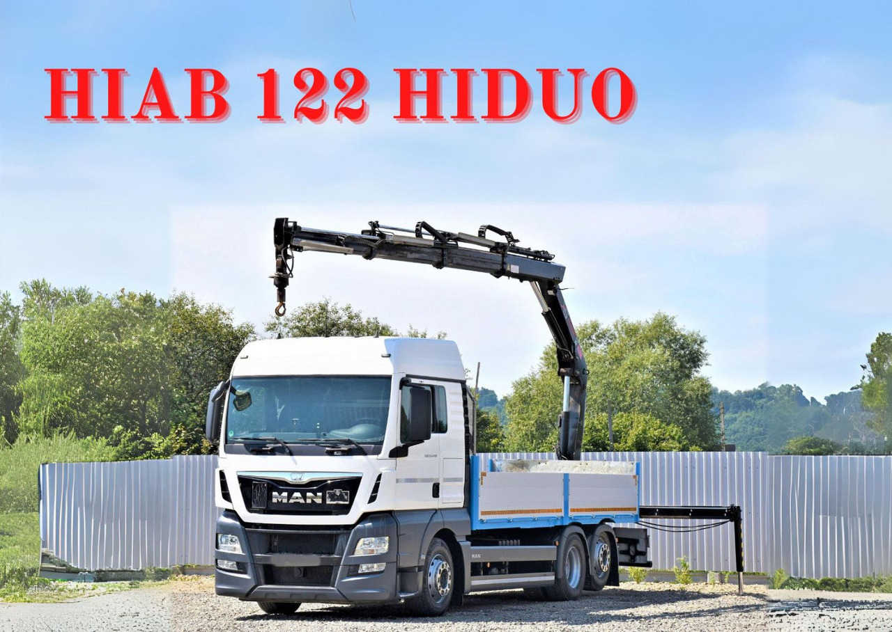 MAN TGX 26.440 Pritsche 6,20 m+HIAB 122 HIDUO/FUNK - Camión grúa: foto 1 MAN TGX 26.440 Pritsche 6,20 m+HIAB 122 HIDUO/FUNK - Camión grúa: foto 1
