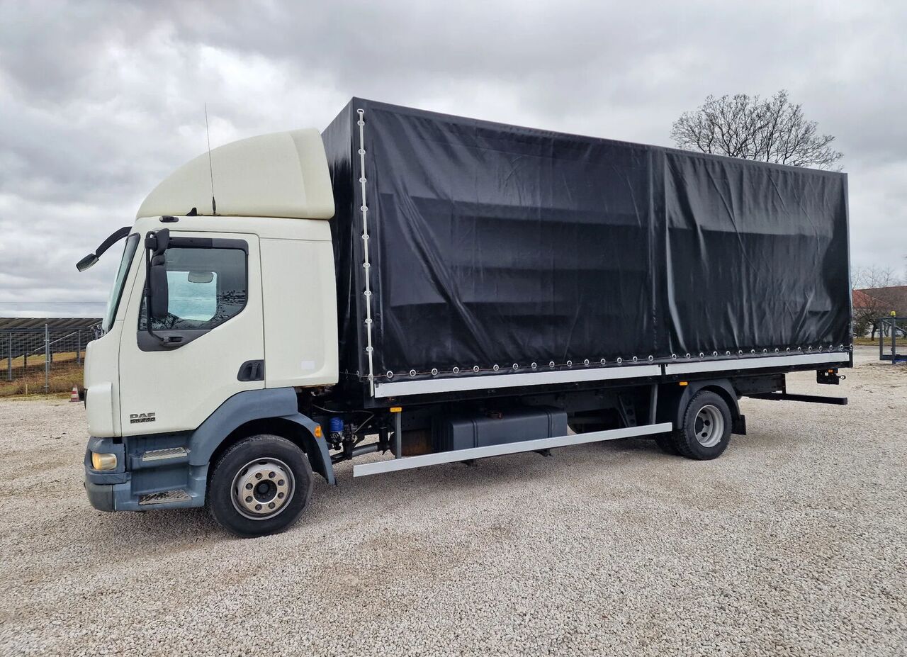 DAF 55.250 curtain-sider truck - Camión lona: foto 1 DAF 55.250 curtain-sider truck - Camión lona: foto 1