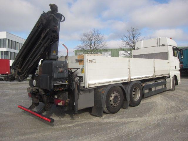 MAN TGX 26.440 mit Hiab-Kran Funkfernbedienung - Camión caja abierta, Camión grúa: foto 4 MAN TGX 26.440 mit Hiab-Kran Funkfernbedienung - Camión caja abierta, Camión grúa: foto 4