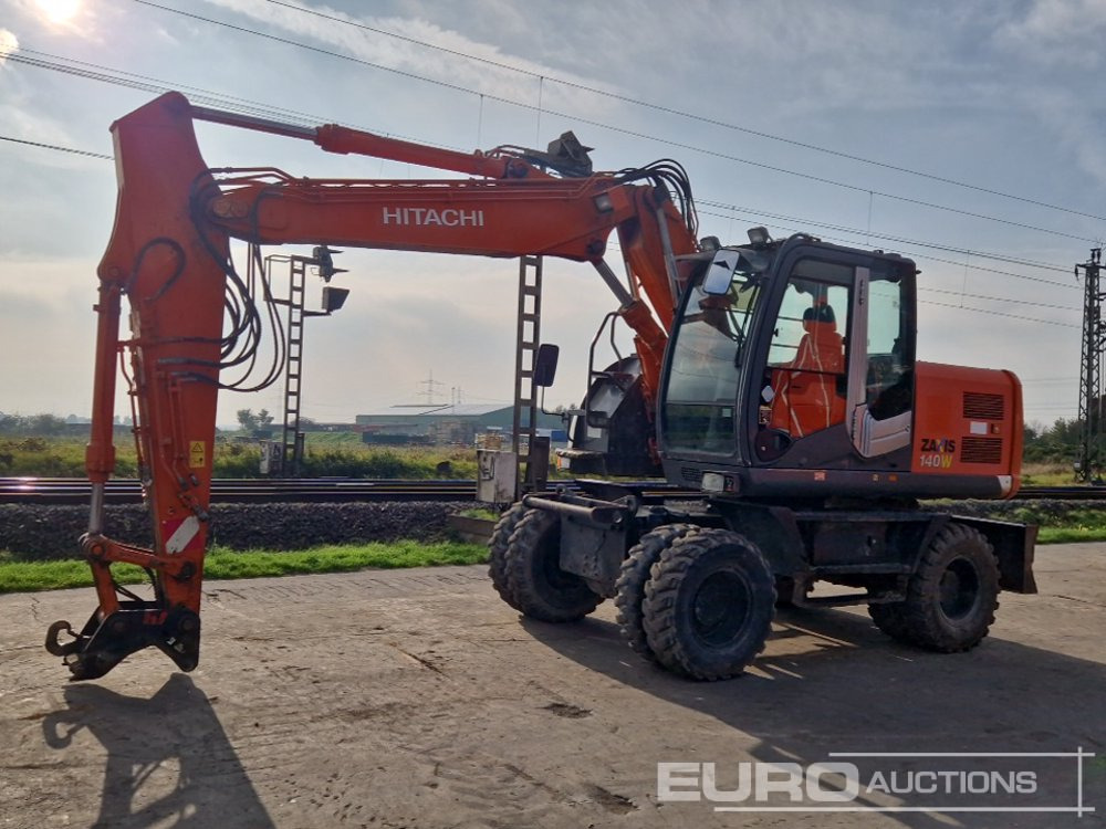 Hitachi ZX140W-3 - Excavadora de ruedas: foto 1 Hitachi ZX140W-3 - Excavadora de ruedas: foto 1