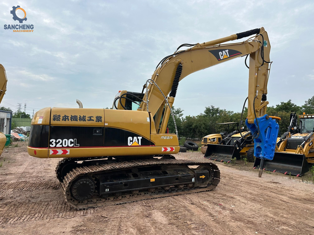 CAT 320CL with hammer crawler excavator - Excavadora de cadenas: foto 1 CAT 320CL with hammer crawler excavator - Excavadora de cadenas: foto 1
