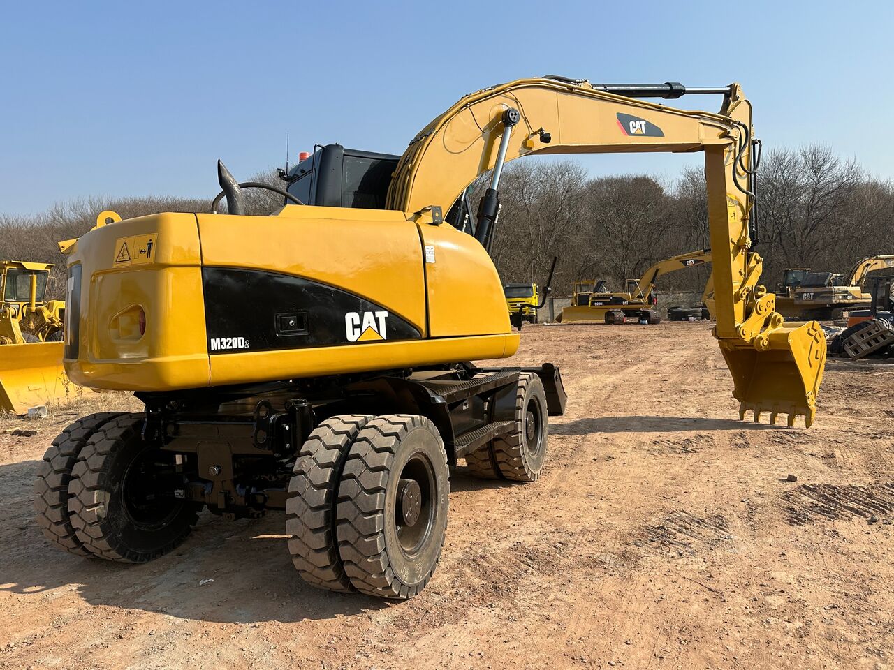 CATERPILLAR M 320 D - Excavadora de ruedas: foto 2 CATERPILLAR M 320 D - Excavadora de ruedas: foto 2