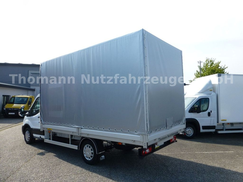 Ford Transit Pritsche Plane 4,25m Klima Temp. DAB Ford Transit Pritsche Plane 4,25m Klima Temp. DAB - Furgoneta con caja de lona: foto 5 Ford Transit Pritsche Plane 4,25m Klima Temp. DAB Ford Transit Pritsche Plane 4,25m Klima Temp. DAB - Furgoneta con caja de lona: foto 5