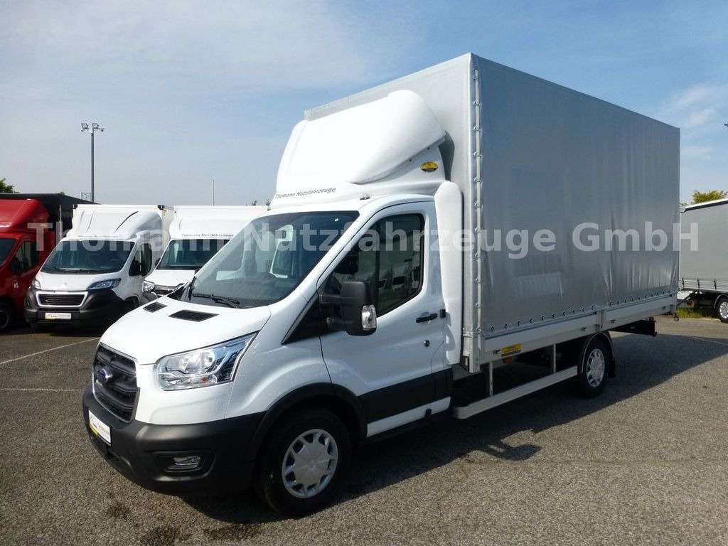 Ford Transit Pritsche Plane 4,25m Klima Temp. DAB Ford Transit Pritsche Plane 4,25m Klima Temp. DAB - Furgoneta con caja de lona: foto 2 Ford Transit Pritsche Plane 4,25m Klima Temp. DAB Ford Transit Pritsche Plane 4,25m Klima Temp. DAB - Furgoneta con caja de lona: foto 2